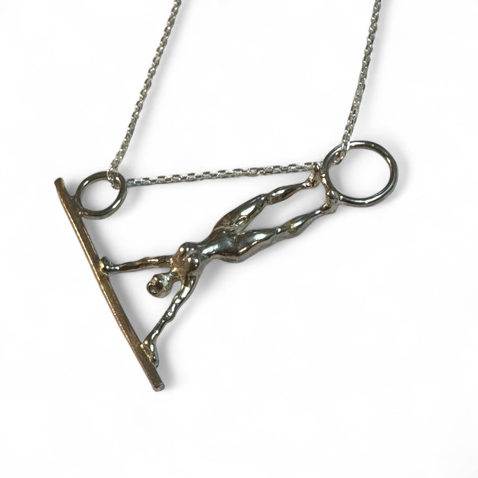 upside down acrobat pendant