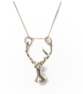 Deer with a tear pendant