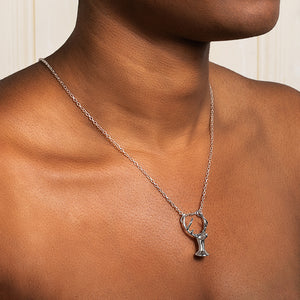Deer with a tear pendant